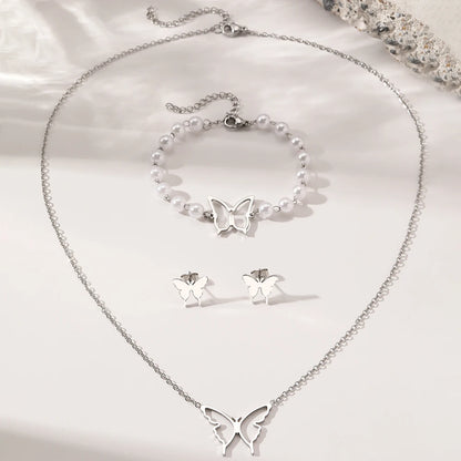 Ensemble de bijoux – Collier, boucles d'oreilles, bracelet en perles et motif papillon