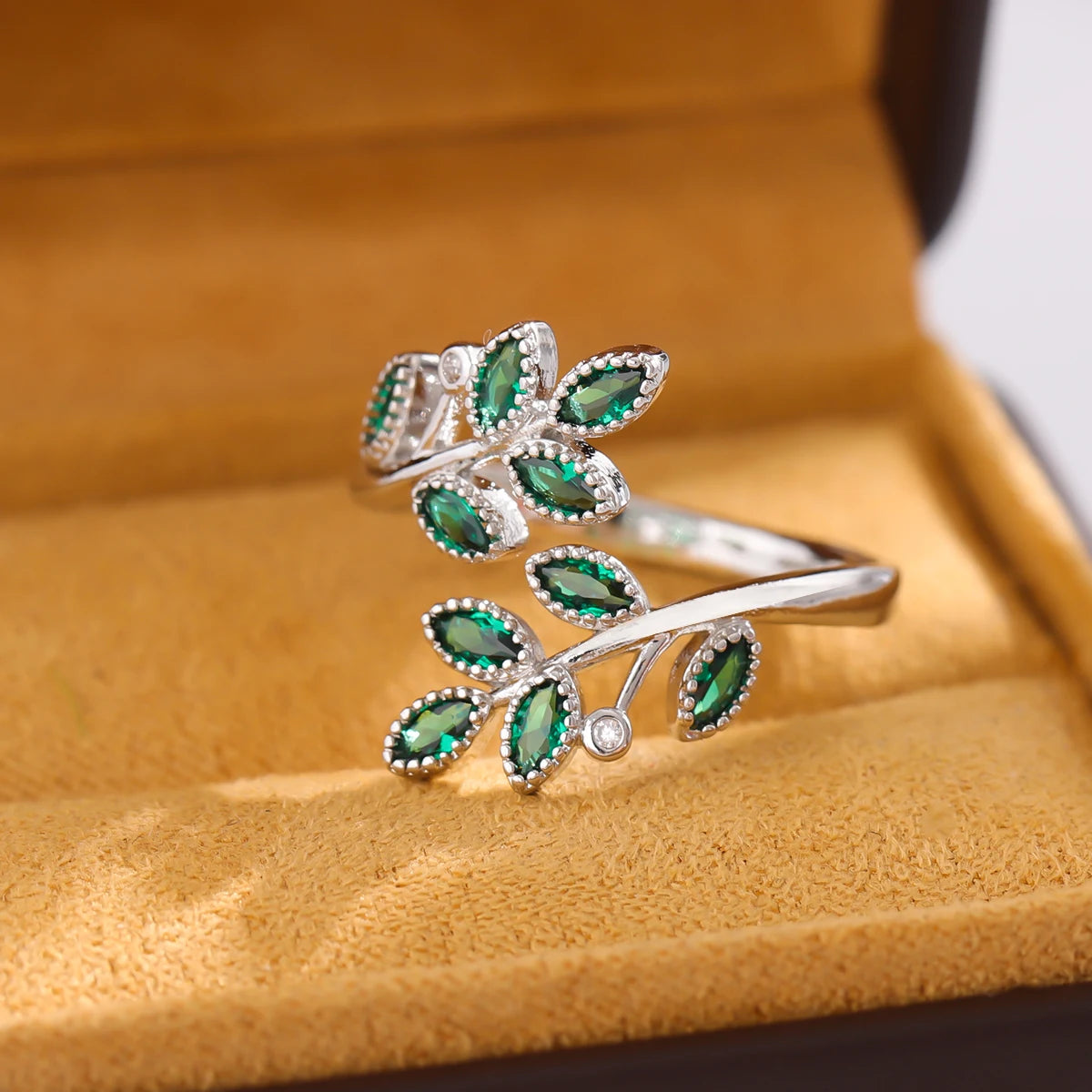 Sterling Silver Ring with Green Crystal Leaves – Open Design