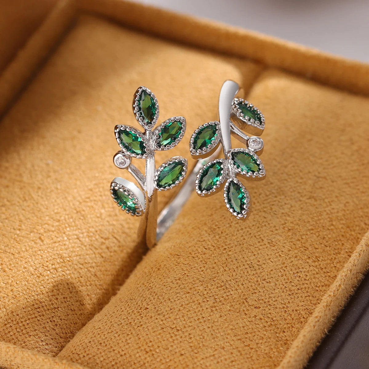 Sterling Silver Ring with Green Crystal Leaves – Open Design