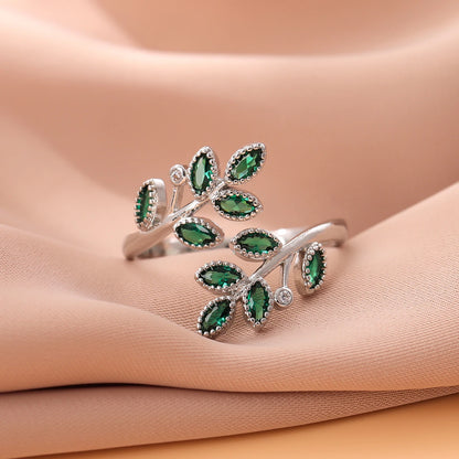 Sterling Silver Ring with Green Crystal Leaves – Open Design