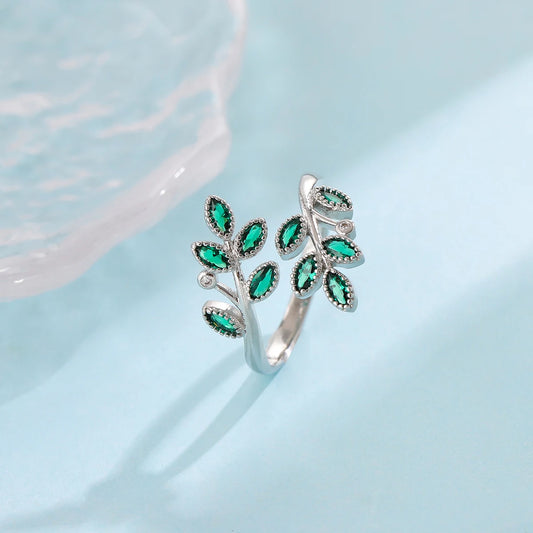 Sterling Silver Ring with Green Crystal Leaves – Open Design