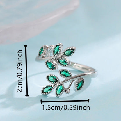 Sterling Silver Ring with Green Crystal Leaves – Open Design