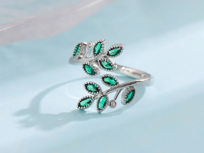 Sterling Silver Ring with Green Crystal Leaves – Open Design