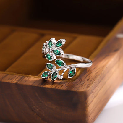 Sterling Silver Ring with Green Crystal Leaves – Open Design